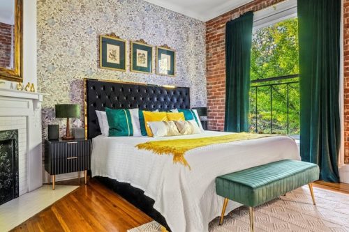 Featuring one of the five thoughtfully decorated bedrooms designed for ultimate comfort and luxury sleep.